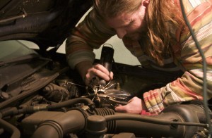 Sparks fly as I cut through the reluctant bolt. Sparks fly as I cut through the reluctant bolt.